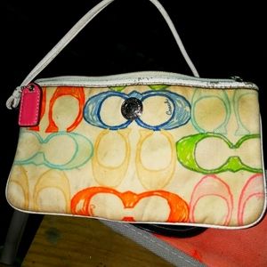 A coach clutch bag.